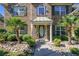 Inviting front entrance with lush landscaping and a well-maintained walkway at 4765 Smokestone Dr, Douglasville, GA 30135