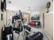 Home gym featuring a treadmill, punching bag and elliptical at 4765 Smokestone Dr, Douglasville, GA 30135