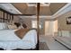 Spacious main bedroom with seating and connecting doors to the en-suite bathroom at 4765 Smokestone Dr, Douglasville, GA 30135