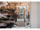 This walk-in closet provides ample storage with shelving, handbags, and shoes, illuminated by a chandelier at 4765 Smokestone Dr, Douglasville, GA 30135