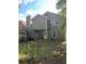 Exterior backyard view of home with siding, deck and stairs, plus a lush grassy area at 615 Amberwood Pl, Euharlee, GA 30145