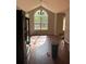 Bright dining room with a large window and hardwood floors, perfect for Gathering meals at 615 Amberwood Pl, Euharlee, GA 30145