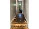 Hallway with unfinished floors and a neutral color scheme, ready for renovation at 615 Amberwood Pl, Euharlee, GA 30145