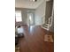 Bright living room with hardwood floors and stairs, perfect for entertaining at 615 Amberwood Pl, Euharlee, GA 30145