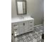 Modern bathroom with stylish tile floors, a vanity, and a large mirror at 1651 Massachusetts Sw Ave # 1, Marietta, GA 30008