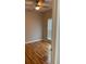 Cozy bedroom with natural light and hardwood flooring throughout at 1651 Massachusetts Sw Ave # 1, Marietta, GA 30008