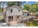 A well-kept home offers a multi-level deck, including a balcony above the lower deck at 3050 Woodland Nw Dr, Kennesaw, GA 30152