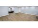 Finished basement featuring light walls and floors with an archway separating space at 4035 Pinebrook Cir, Cumming, GA 30028