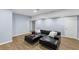 Finished basement features recreational space, modern flooring, and plenty of room for activities at 4035 Pinebrook Cir, Cumming, GA 30028