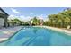Inviting community pool featuring comfortable lounge chairs and a serene atmosphere at 4035 Pinebrook Cir, Cumming, GA 30028