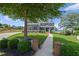 Charming two-story home with well-manicured lawn and inviting walkway leading to the front door at 4035 Pinebrook Cir, Cumming, GA 30028
