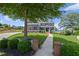 Beautiful two-story home with mature landscaping, walkway, manicured lawn and inviting curb appeal at 4035 Pinebrook Cir, Cumming, GA 30028