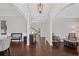 Spacious foyer with hardwood floors, elegant lighting, and open archways, creating a grand entrance at 4035 Pinebrook Cir, Cumming, GA 30028
