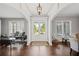 Bright, spacious foyer with hardwood floors and an elegant entrance showcases the home's character at 4035 Pinebrook Cir, Cumming, GA 30028