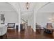 Elegant foyer with dark wood floors, arched entryways, and stylish furnishings creates a welcoming atmosphere at 4035 Pinebrook Cir, Cumming, GA 30028