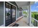 Charming front porch with detailed columns and a view of the neighborhood at 4035 Pinebrook Cir, Cumming, GA 30028