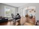 Home office and formal dining area featuring hardwood floors and ample natural light at 4035 Pinebrook Cir, Cumming, GA 30028