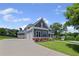 Stylish two-story home with a three-car garage, landscaped yard, and a charming exterior at 4035 Pinebrook Cir, Cumming, GA 30028