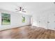 Spacious bedroom features laminate wood flooring, large windows and a ceiling fan at 1105 Sallete Ct, Marietta, GA 30066