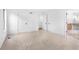 Spacious bedroom features neutral carpet and leads to closets and updated ensuite bathroom at 1105 Sallete Ct, Marietta, GA 30066