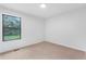 Bedroom features carpet floors and a window with a view of the outdoors at 1105 Sallete Ct, Marietta, GA 30066