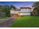 Charming two-story home with a well-manicured lawn, two car garage and covered entry at 1105 Sallete Ct, Marietta, GA 30066