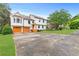 Exterior shot showing the driveway and two-car garage with well-manicured lawn at 1105 Sallete Ct, Marietta, GA 30066