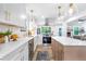 Updated kitchen with white cabinets, stainless steel appliances, and island with breakfast bar at 1105 Sallete Ct, Marietta, GA 30066