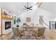 Spacious living room with vaulted ceilings, fireplace, modern ceiling fan, and natural lighting at 1105 Sallete Ct, Marietta, GA 30066