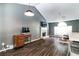 Open living room with hardwood floors, vaulted ceilings, a fireplace and lots of space at 2204 Dresden Nw Grn, Kennesaw, GA 30144