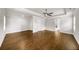 Spacious main bedroom features a trey ceiling and hardwood flooring at 4093 Groveland Park Dr, Powder Springs, GA 30127