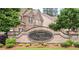 Community entrance sign that reads: Vineyards at New Macland at 4093 Groveland Park Dr, Powder Springs, GA 30127