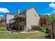 Two story home featuring a private backyard, patio and screened in porch at 139 Lake Reserve Way, Canton, GA 30115
