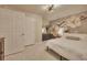 Bedroom featuring flower mural wall, white trim, neutral carpet and fan with lighting at 139 Lake Reserve Way, Canton, GA 30115