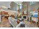 Living room featuring an open floor plan, fireplace, and modern furnishings at 139 Lake Reserve Way, Canton, GA 30115