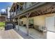 Covered patio area with ample seating, perfect for outdoor entertaining at 139 Lake Reserve Way, Canton, GA 30115