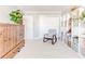 Comfortable bedroom with a rocking chair and white built in shelving at 1445 Monroe Ne Dr # F18, Atlanta, GA 30324