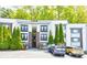 Modern apartment building with well-maintained landscaping and convenient parking at 1445 Monroe Ne Dr # F18, Atlanta, GA 30324