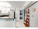 Kitchen showcases stainless appliances, laundry closet, and white cabinets at 1445 Monroe Ne Dr # F18, Atlanta, GA 30324