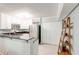 Efficient kitchen with stainless steel appliances, granite countertops, and white cabinets at 1445 Monroe Ne Dr # F18, Atlanta, GA 30324