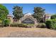 Community entrance sign for Sawgrass Estates: A Legacy and Community, brick pillars and lush landscaping at 1907 Sea Oats Dr, Hampton, GA 30228