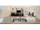 Open floor plan features kitchen view to the living and dining rooms at 1907 Sea Oats Dr, Hampton, GA 30228