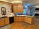 Modern kitchen featuring granite countertops, stainless steel appliances, and ample cabinet space for storage at 5440 Cameron Forest Pkwy, Johns Creek, GA 30022