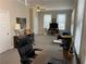 Large office with carpet, ceiling fan, and plenty of natural light at 5440 Cameron Forest Pkwy, Johns Creek, GA 30022