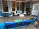 Beautifully decorated outdoor patio space with cozy seating, a swing, and a stylish outdoor table at 5440 Cameron Forest Pkwy, Johns Creek, GA 30022