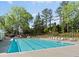 A beautiful outdoor swimming pool with lounge chairs for relaxing on a sunny day at 5440 Cameron Forest Pkwy, Johns Creek, GA 30022