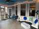 Covered porch with furniture and natural light at 5440 Cameron Forest Pkwy, Johns Creek, GA 30022