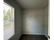 Spacious closet with carpet floors, a window, and wire rack shelving is ready for your storage needs at 55 Barton Ln, Covington, GA 30016