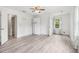 Spacious bedroom offering ample light and gorgeous laminate flooring at 771 James Cir, Lawrenceville, GA 30046