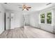 Spacious bedroom with laminate flooring and an abundance of natural light at 771 James Cir, Lawrenceville, GA 30046